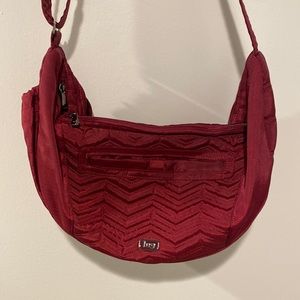 Lug Zip Front Sling Boomerang Crossbody Bag